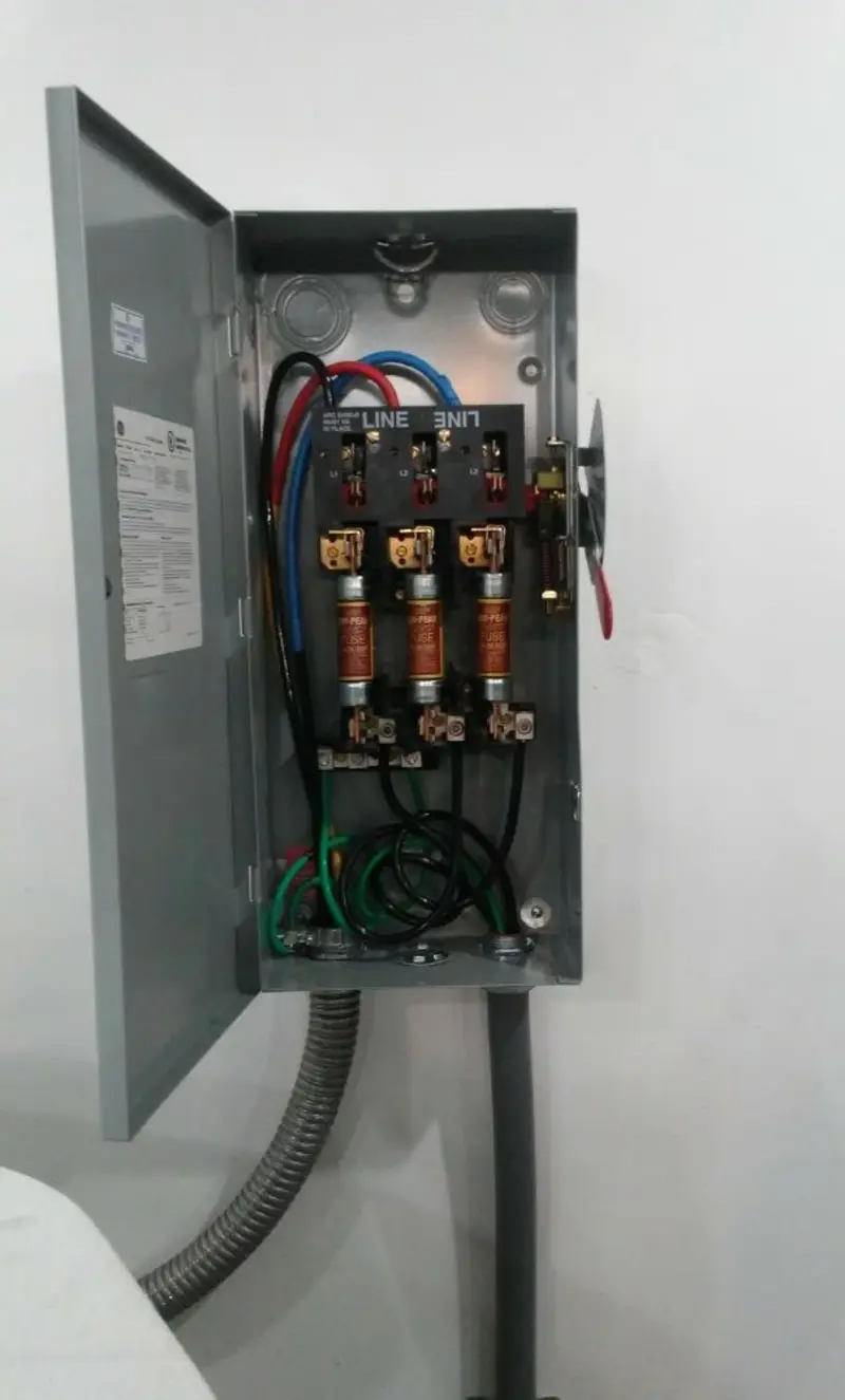 Three-phase disconnect switch installed for Smoke Detector Installation in Burns